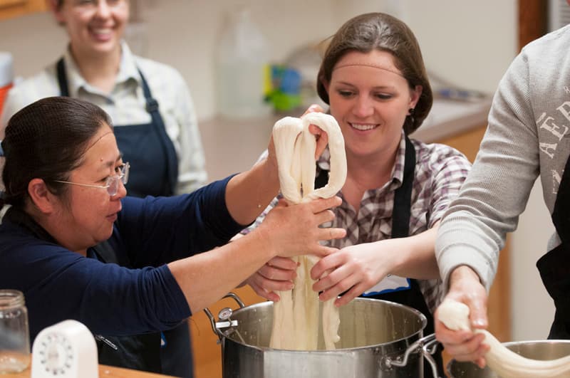 Stretching mozzarella by hand